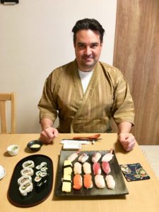 the guest with beautiful sushi he made