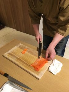 slicing salmon